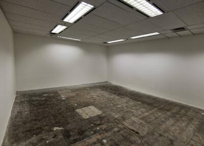 Empty room with fluorescent lighting