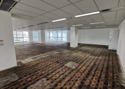 Spacious empty office with large windows