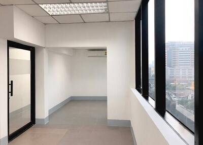 Empty office with large windows