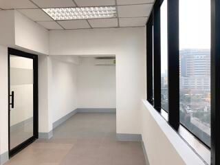 Empty office with large windows