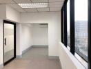 Empty office with large windows