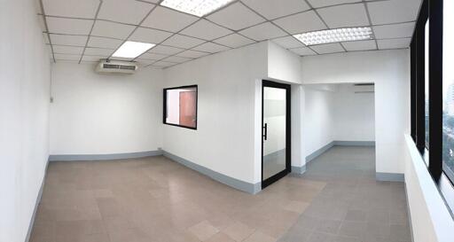 empty office space with windows and air conditioning