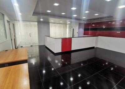 Spacious reception area with modern design and glossy flooring
