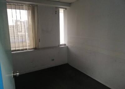 Empty bedroom with window and blinds