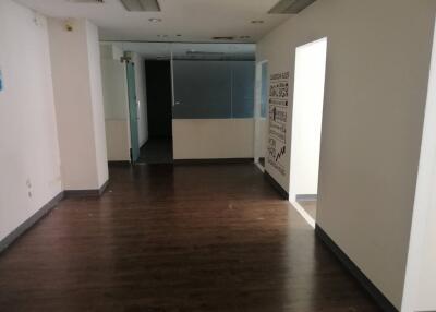 Empty office space with glass partition