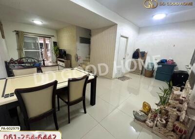 Spacious living area with dining table and additional decor