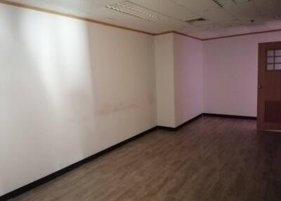 Empty room with wood laminate flooring