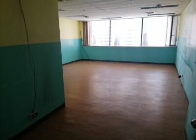 empty room with large windows