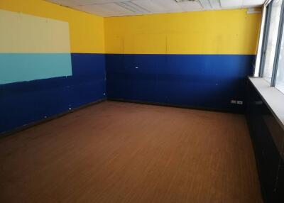 Empty room with yellow and blue walls