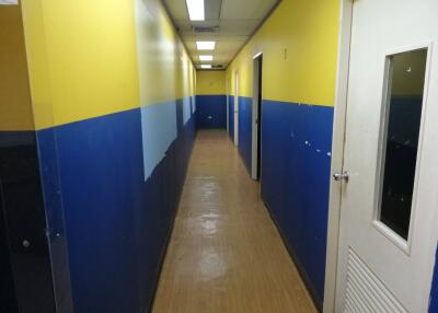 Hallway with yellow and blue walls