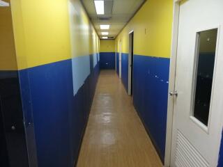 Hallway with yellow and blue walls