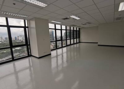 Spacious vacant office space with large windows