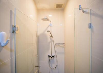 modern shower area with glass doors