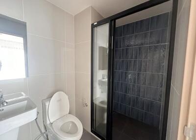 Modern bathroom with glass shower door