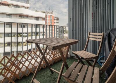 Balcony with outdoor furniture and city view