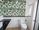 Modern bathroom with nature-themed wall tiles