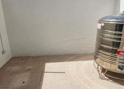 Open balcony with water tank