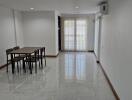 Minimalist dining area with table and four chairs