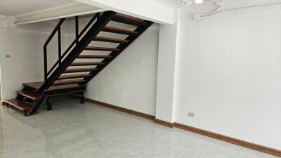 Modern living room with staircase