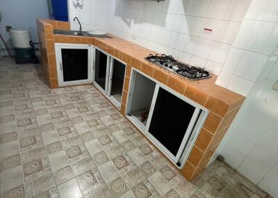 Kitchen with countertop and cabinets