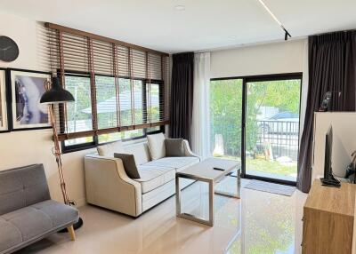 Modern living room with large windows