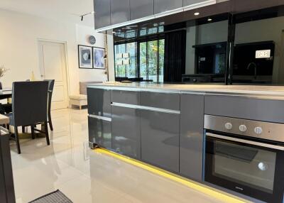 Modern kitchen with sleek cabinets and appliances