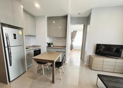 Modern kitchen and dining area with appliances