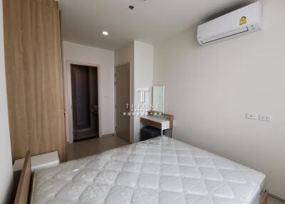 Bedroom with furniture and air conditioning