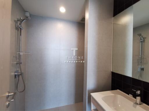 Modern bathroom with a shower and sink