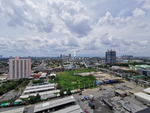 High-angle view of city buildings and sky