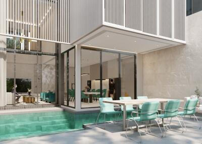 Modern outdoor dining area with pool