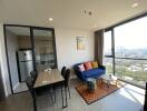 Modern living room with dining area and kitchen