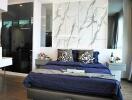 Modern bedroom with marble accent wall