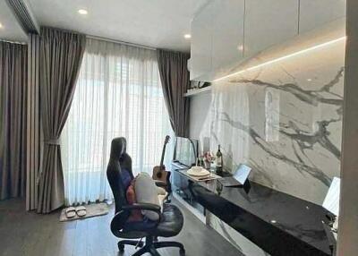 Modern home office with marble wall
