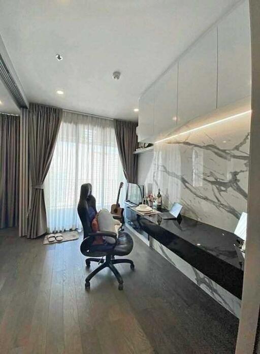 Modern home office with marble wall