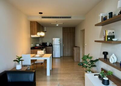 Modern open-plan living room with kitchen and dining area