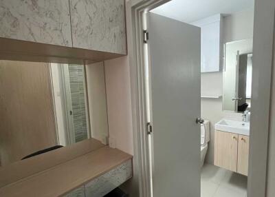 Bathroom with vanity and mirror