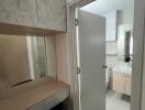 Bathroom with vanity and mirror