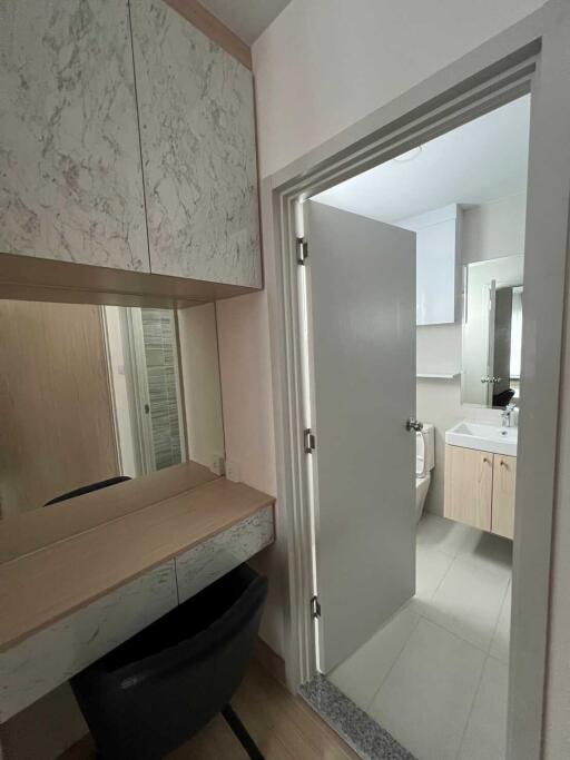 Bathroom with vanity and mirror