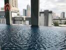 Modern cityscape view from rooftop pool