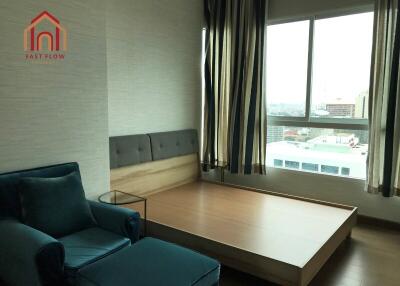 Bedroom with window and furniture