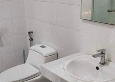 Modern bathroom with toilet and sink