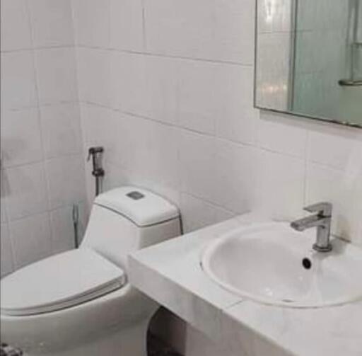 Modern bathroom with toilet and sink