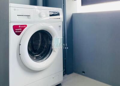 Washing machine in a laundry area