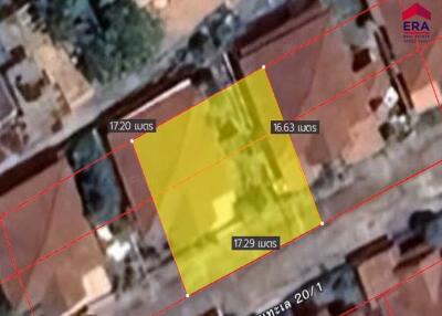 Aerial view of a land plot with measurements