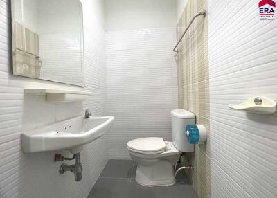 Clean and modern bathroom with sink and toilet