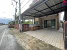 Outdoor view of a house with a covered patio