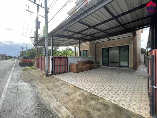 Outdoor view of a house with a covered patio