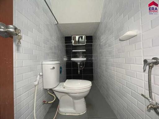 Clean and modern bathroom with toilet and sink