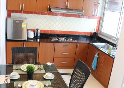 Modern kitchen with dining area